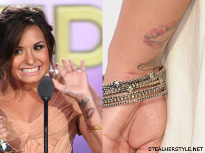 Demi Lovato Kiss Tattoo